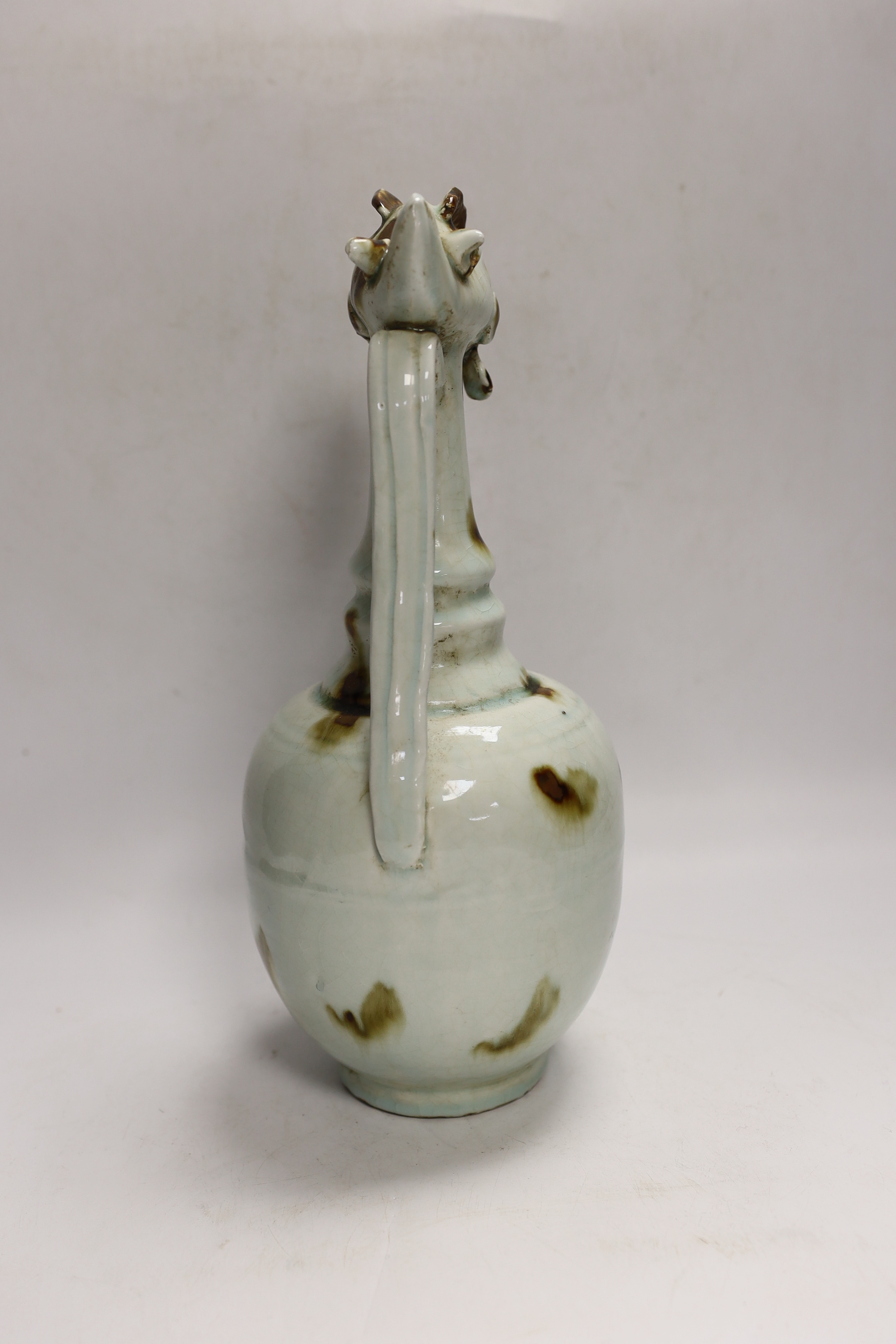 A Chinese longquan chicken head wine ewer, 30cm